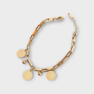 Pulsera con monedas doradas